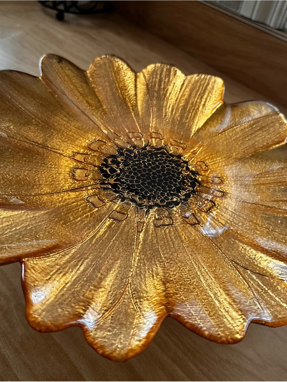 Gold sunflower glass decorative plate on a pedestal stand